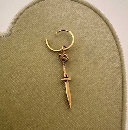14K yellow gold lamb with sword and bones sculptural charm hanging from gold hoop earring, Anomaly Relic House Relic Collection