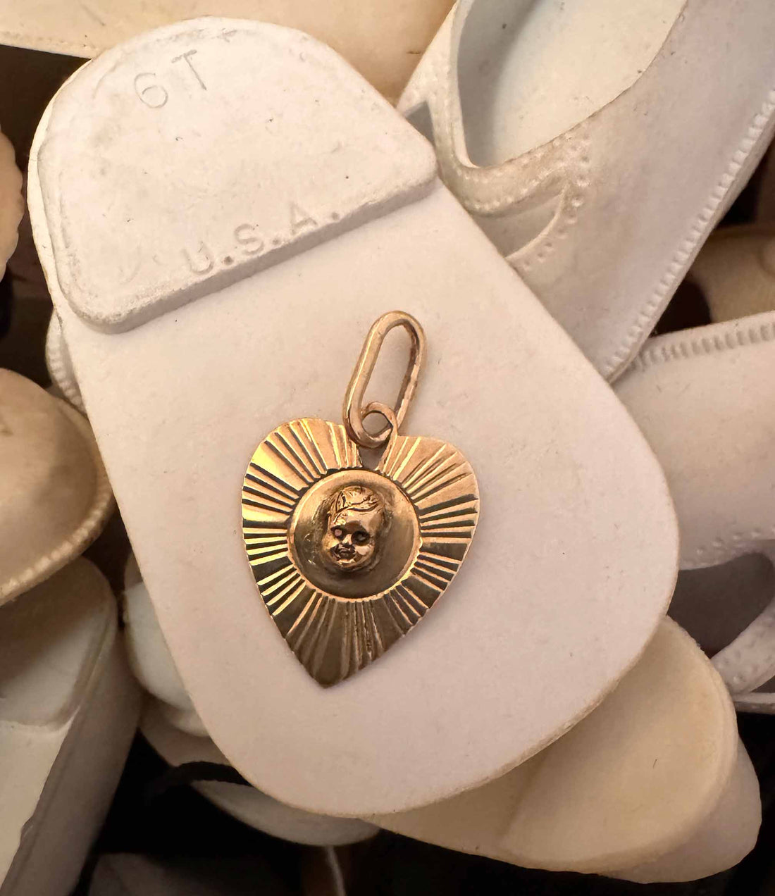 Vintage engine-turned gold heart charm with hand-sculpted baby head and black diamond eyes, one of a kind, Anomaly Relic Reliquary Collection NYC