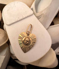 Vintage engine-turned gold heart charm with hand-sculpted baby head and black diamond eyes, one of a kind, Anomaly Relic Reliquary Collection NYC
