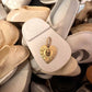 Vintage engine-turned gold heart charm with hand-sculpted baby head and black diamond eyes, one of a kind, Anomaly Relic Reliquary Collection NYC